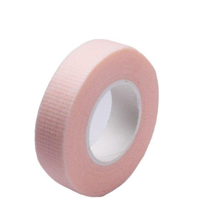 Sensitive tape for eyelash extensions, designed for delicate skin to secure lower lashes during application, providing gentle adhesion and reducing irritation.